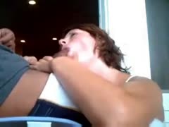 On webcam, a lewd, dark-brown girlfriend passionately sucks my enormous, dark ramrod.